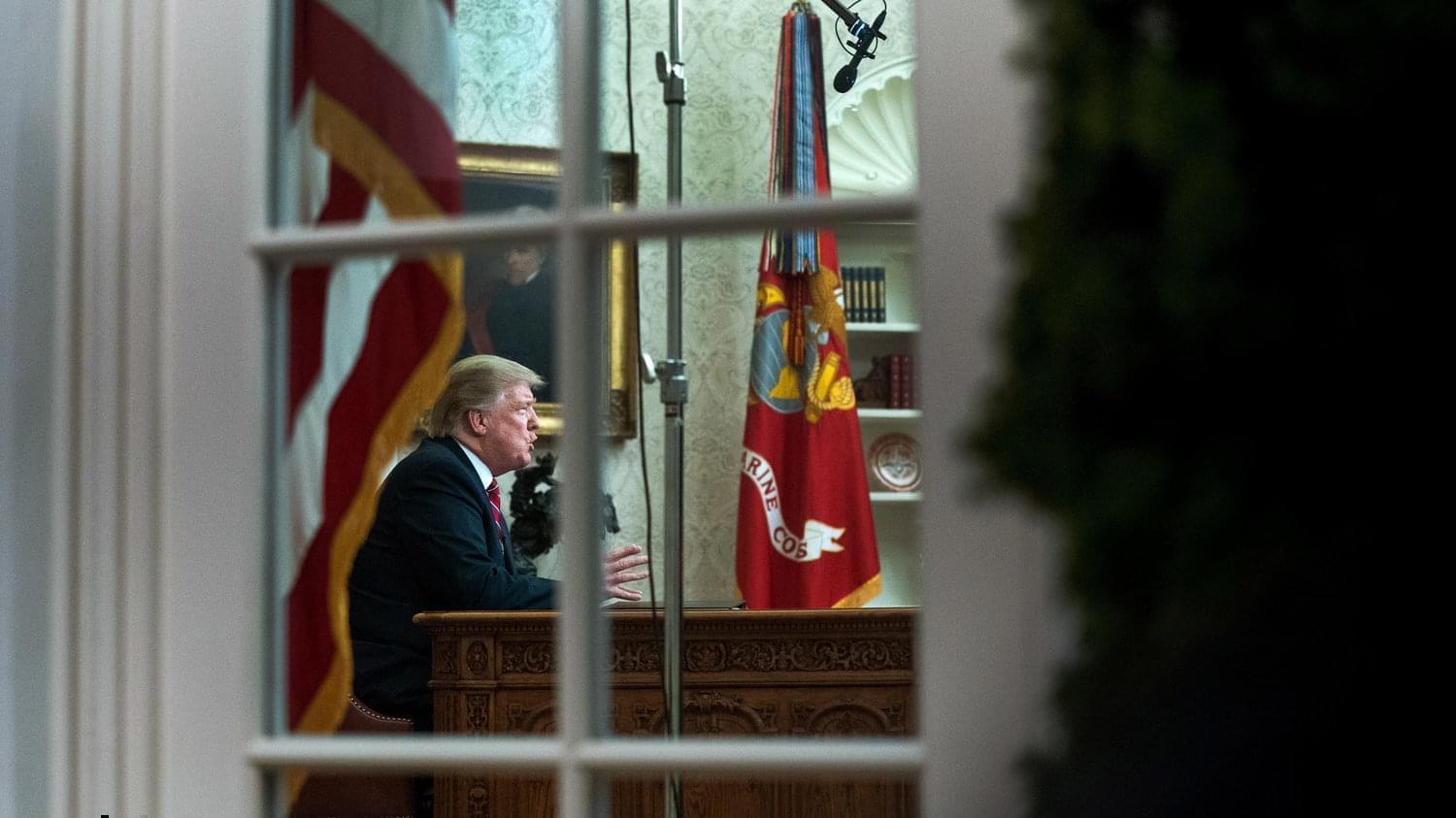 President Trump speaks to the nation in his first-prime address from the Oval Office of the White House on Tuesday.