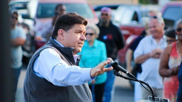 J.B. Pritzker speaks with union supporters at a 2017 rally in Springfield. He's scheduled to take the oath of office at 12:01 p.m. Monday.