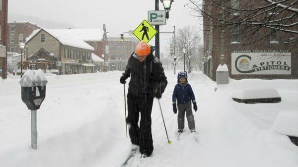 Nicholas Nicolet and his son Rocco cross-country ski on Sunday in Montpelier, Vt. A major winter storm hit the Midwest and New England this weekend.