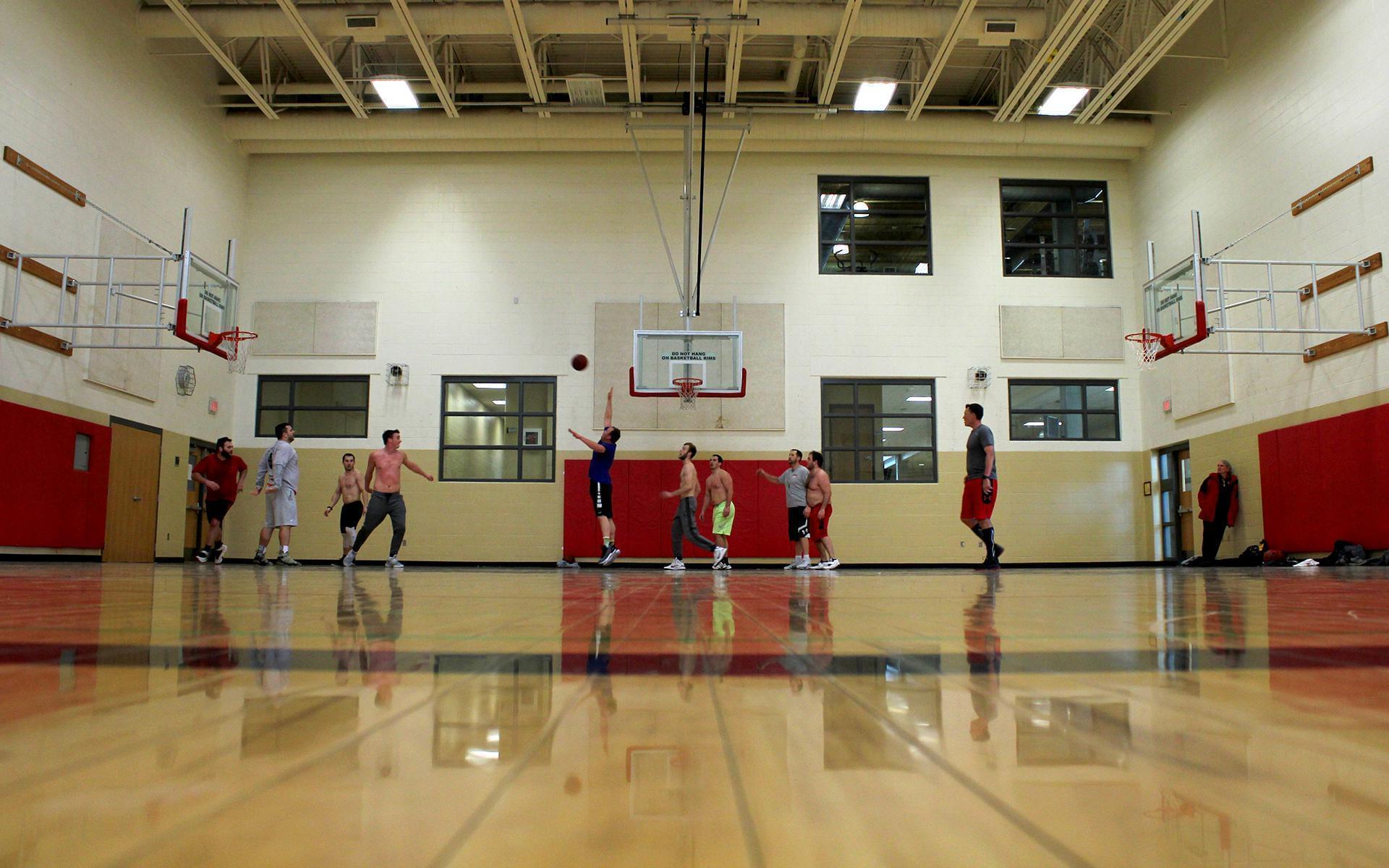 Bison rims factor into this lunch-hour game of pickup basketball at a Lincoln, Nebraska YMCA.