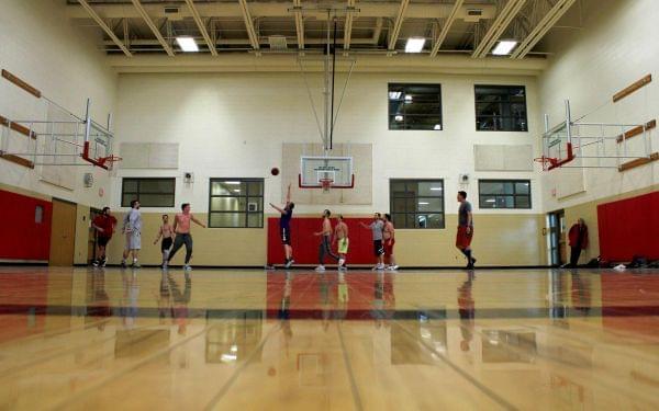 Bison rims factor into this lunch-hour game of pickup basketball at a Lincoln, Nebraska YMCA.