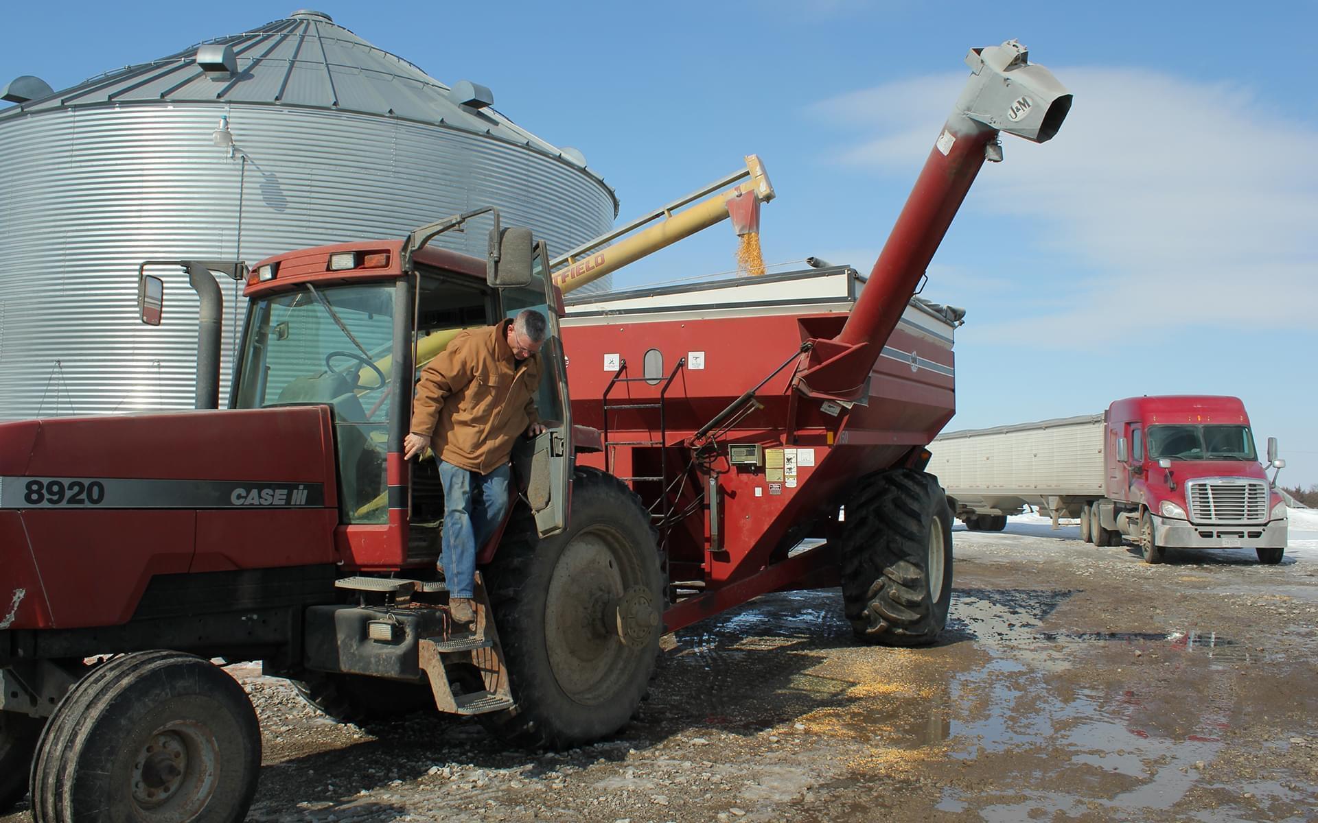 Ben Steffen fills a truck with corn that he'll haul to a grain elevator 80 miles away. A silver lining of this long winter is that Steffen can earn a premium for delivering while other farmers are stuck on snow-packed roads.