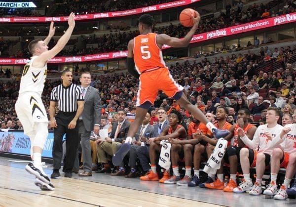 The Illini bench watches teammate Tevian Jones save a loose ball during a Big Ten Tournament loss to Iowa on Thursday in Chicago.