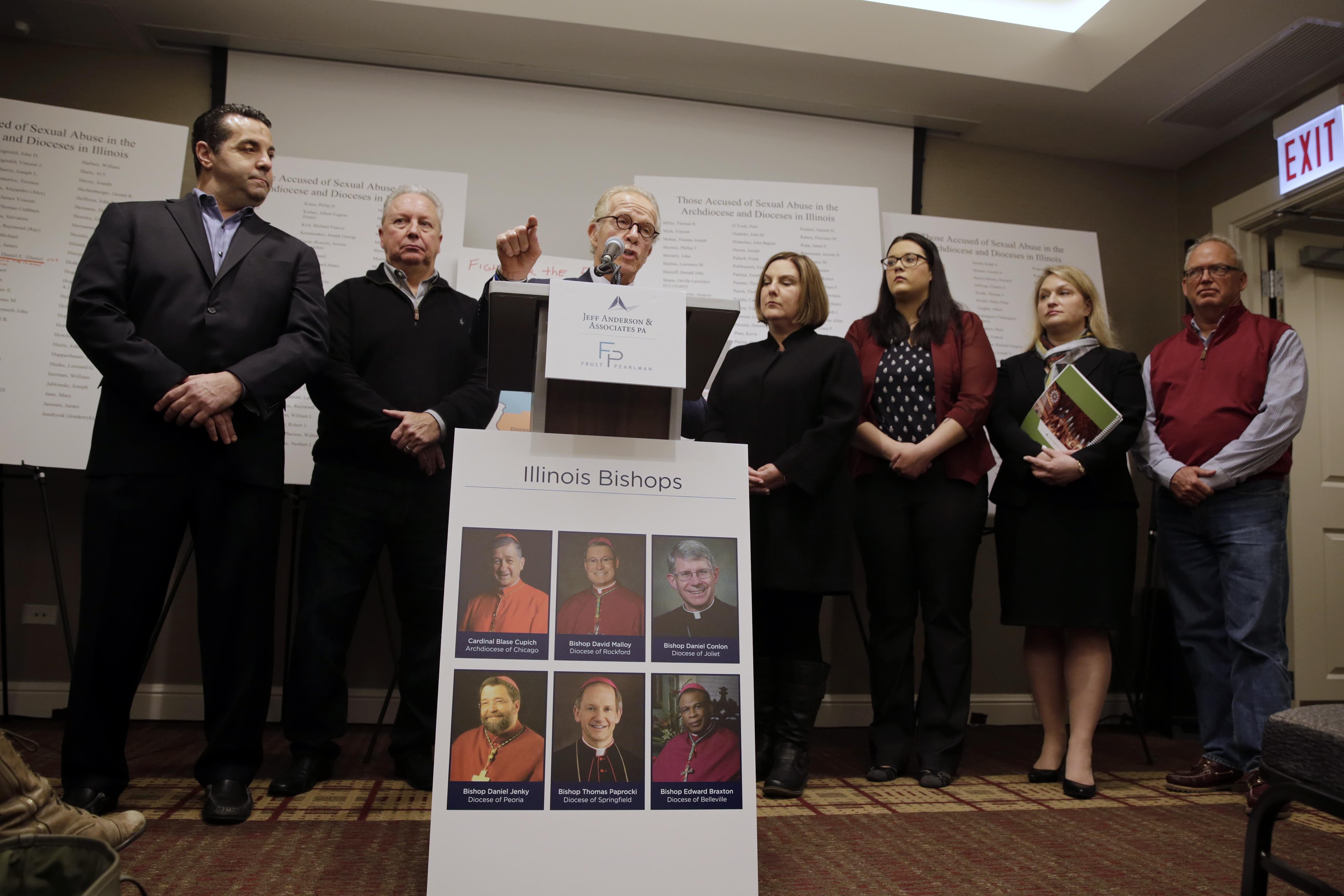 Attorney Jeff Anderson speaks as attorney Marc Pearlman, left, and clergy abuse victims listen during a news conference, Wednesday, March 20, 2019, in Chicago.