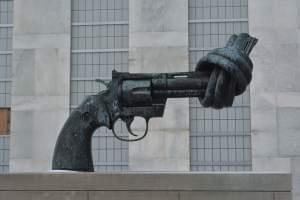 statue of a handgun with the barrel tied in a knot