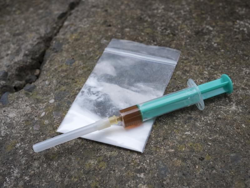 syringe and heroin