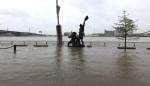 A statue of explorers Lewis and Clark is surrounded by floodwater along the St. Louis riverfront, Thursday, May 2, 3019. Several Mississippi River towns are seeing floods that are closing in on the historic levels reached in 1993. 
