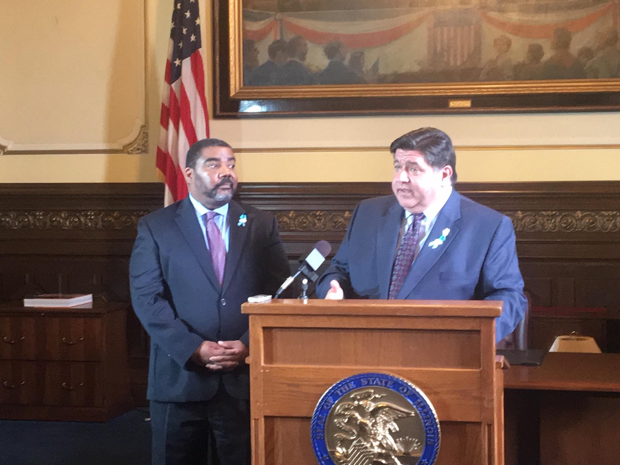 Gov. J.B. Priztker and DCFS Acting Director Marc Smith announced plans to overhaul the department's troubled Intact Family Services unit.