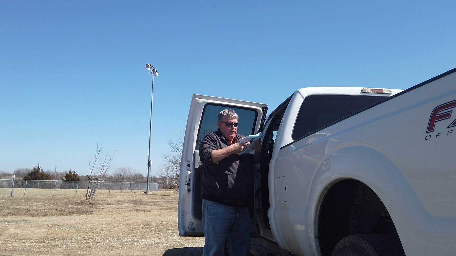 Mark Junker by his pickup truck.