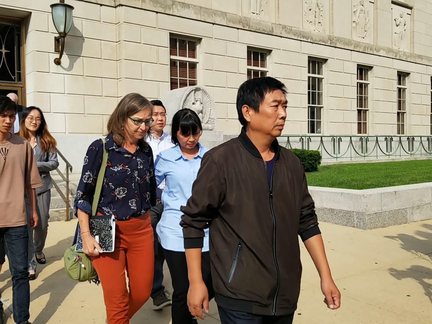 Yingying Zhang's parents leave the federal courthouse in Peoria on Monday.