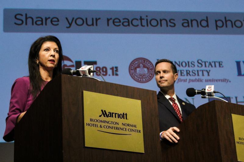 Betsy Dirksen Londrigan and Congressman Rodney Davis at a debate in Normal in 2018.