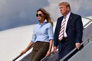President Trump disembarks Air Force One with First Lady Melania Trump, on Aug, 4, 2019 after two mass shootings over the weekend. Trump has called for "strong background checks" in response to the shootings. 