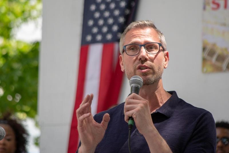 Illinois Treasurer Michael Frerichs delivers remarks at the Governor's Day Picnic at the Illinois State Fairgrounds on Aug. 14