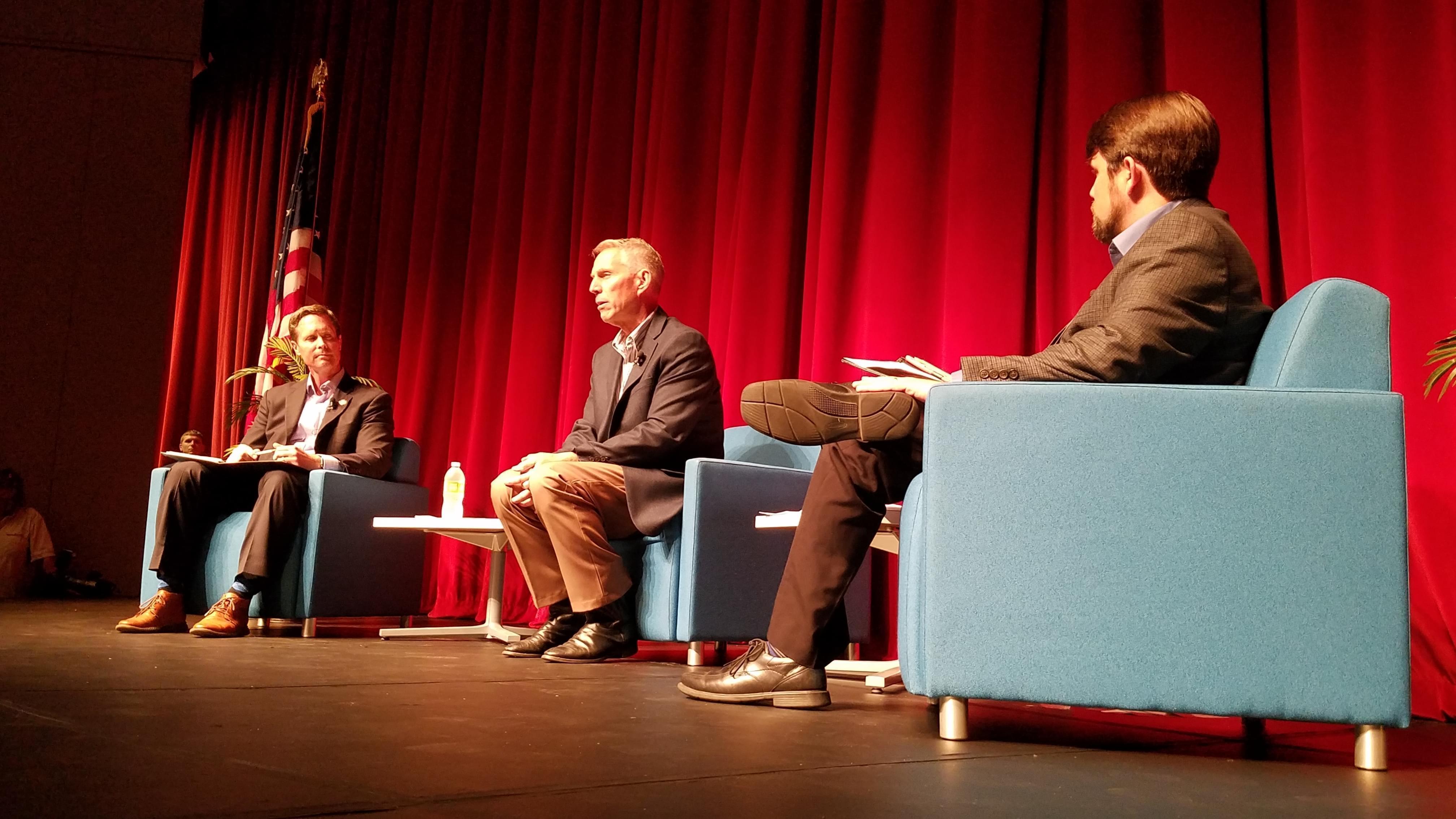Congressman Rodney Davis, State Representative Brad Holbrook and Steve Beatty of WDWS Radio share the stage at Davis' Open Government Night event.