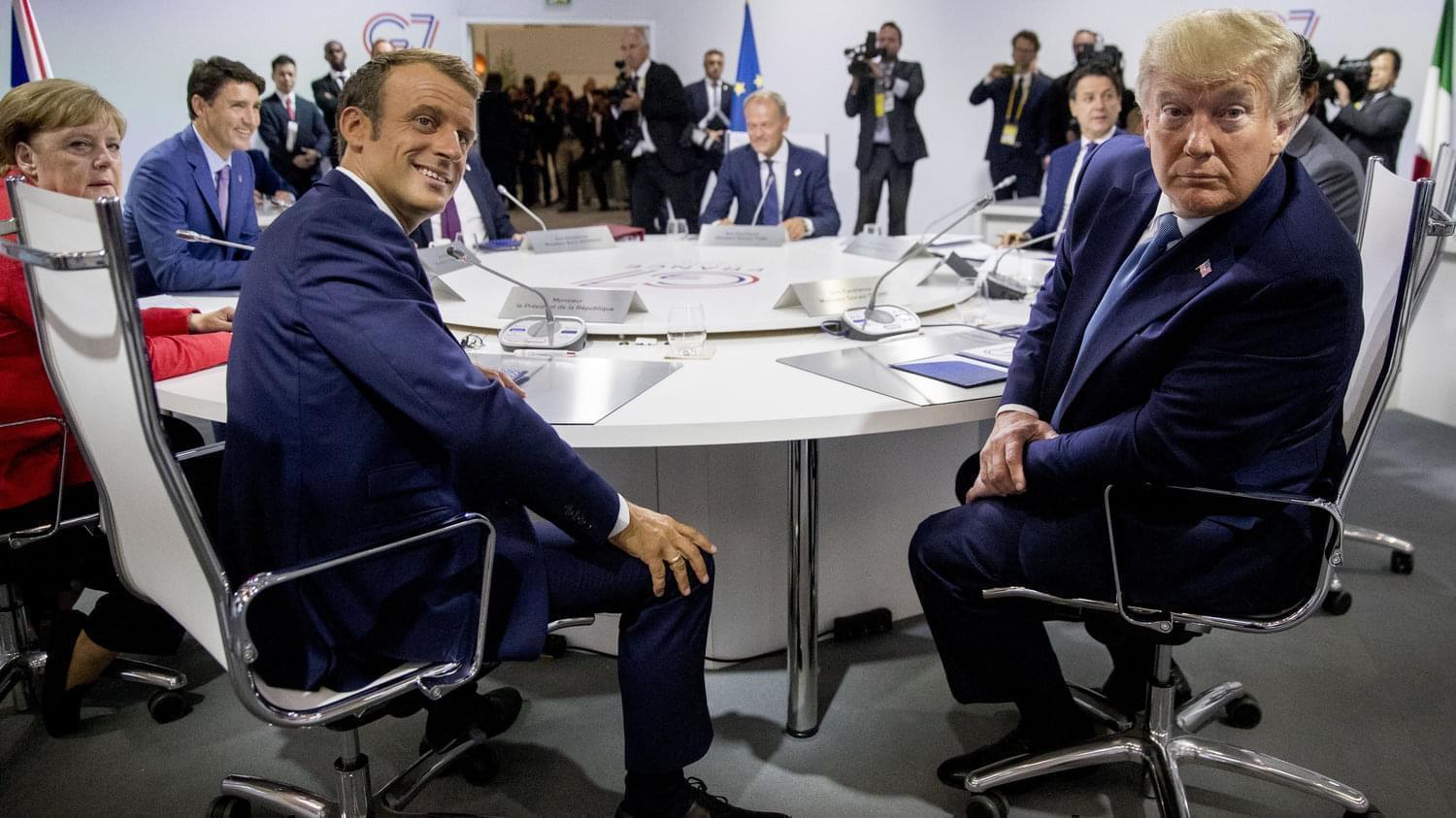 French President Emmanuel Macron (left) and President Trump participate in a G-7 working session. Trump is in Biarritz, France, for the G-7 summit of the world's biggest economic powers.