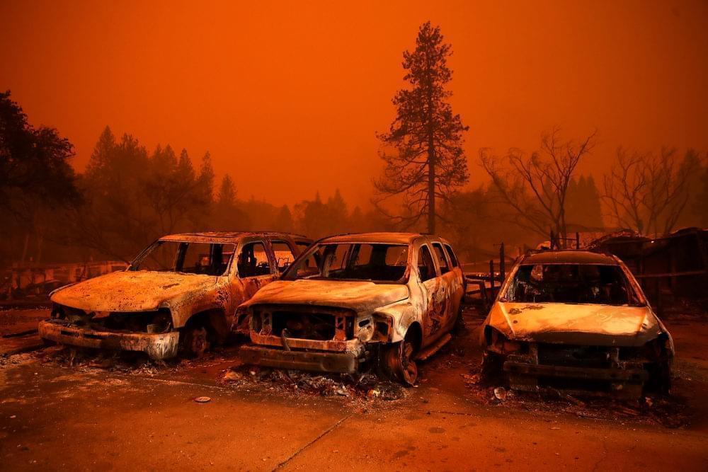 Cars destroyed by the Camp Fire sit in the lot at a used car dealership on November 9, 2018 in Paradise, California.
