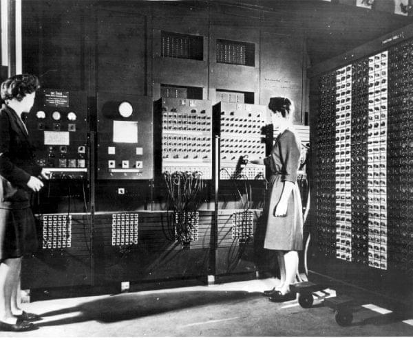 Two women working with the early computer ENIAC