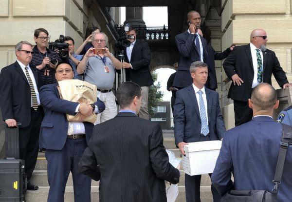 FBI agents removed cardboard boxes, paper bags and at least one computer from the Springfield offices of state Sen. Martin Sandoval in this file photo from Sept. 24, 2019.