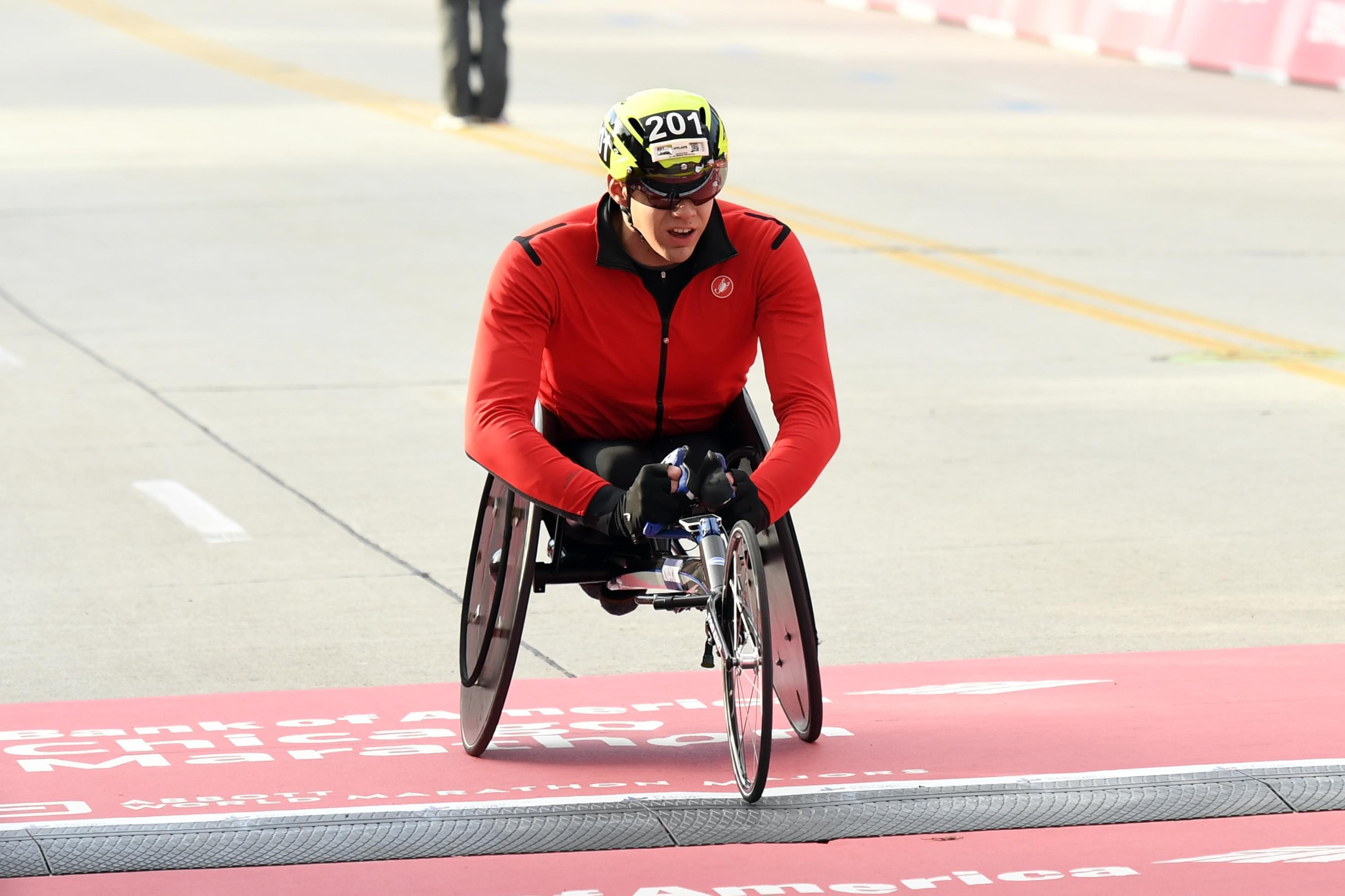 Daniel Romanchuk wins the Men's Wheelchair Chicago Marathon Sunday, in Chicago. 