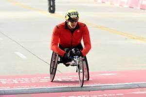 Daniel Romanchuk wins the Men's Wheelchair Chicago Marathon Sunday, in Chicago. 