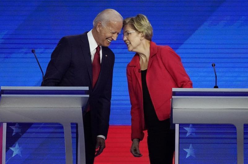 Democratic presidential candidates Joe Biden and Sen. Elizabeth Warren, D-Mass., connect before the September Democratic presidential primary debate. 
