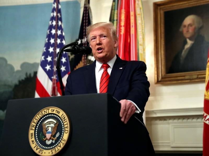 President Donald Trump speaks in the Diplomatic Room of the White House in Washington, D.C., on Sunday.