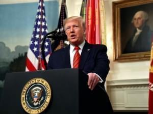 President Donald Trump speaks in the Diplomatic Room of the White House in Washington, D.C., on Sunday. 