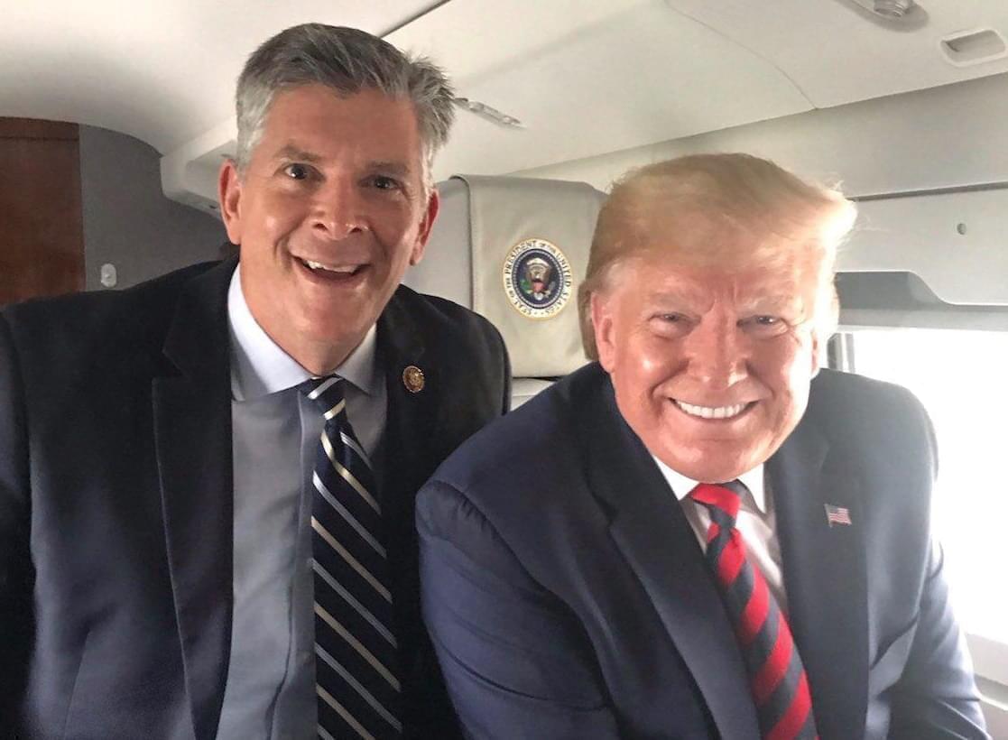 U.S. Rep. Darin LaHood, left, with President Trump on Monday aboard Air Force One.