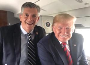 U.S. Rep. Darin LaHood, left, with President Trump on Monday aboard Air Force One.