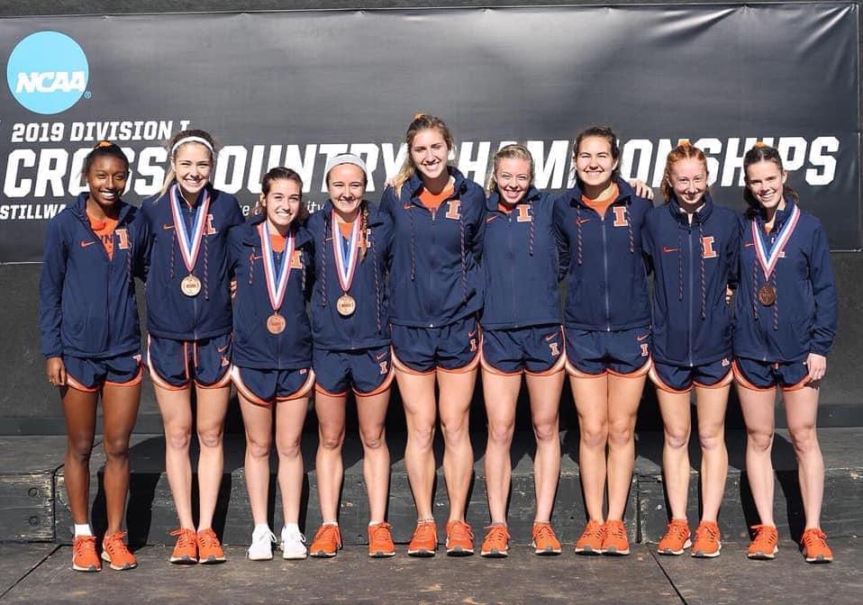 The Illinois women's cross country team celebrating their NCAA Regional title.