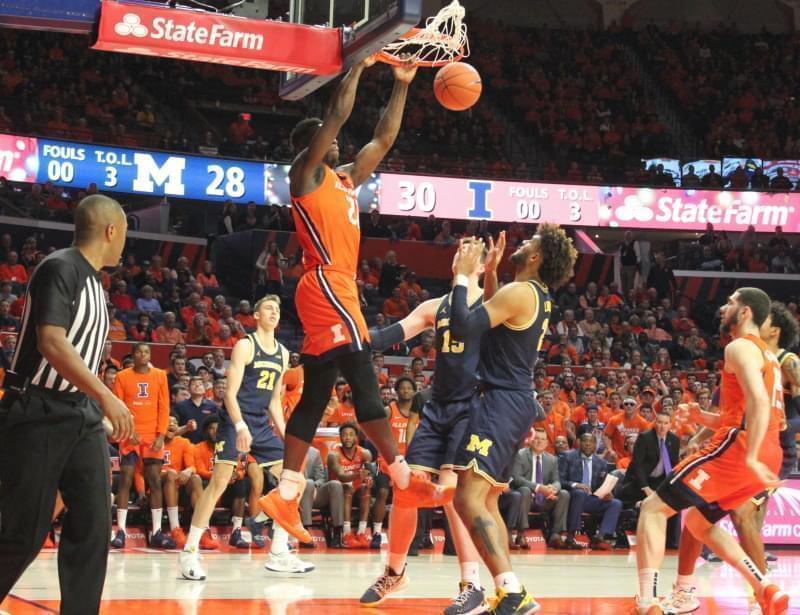 Kofi Cockburn slams in two of his 19 points during Illinois' 71-62 win over Michigan on Wednesday in Champaign.