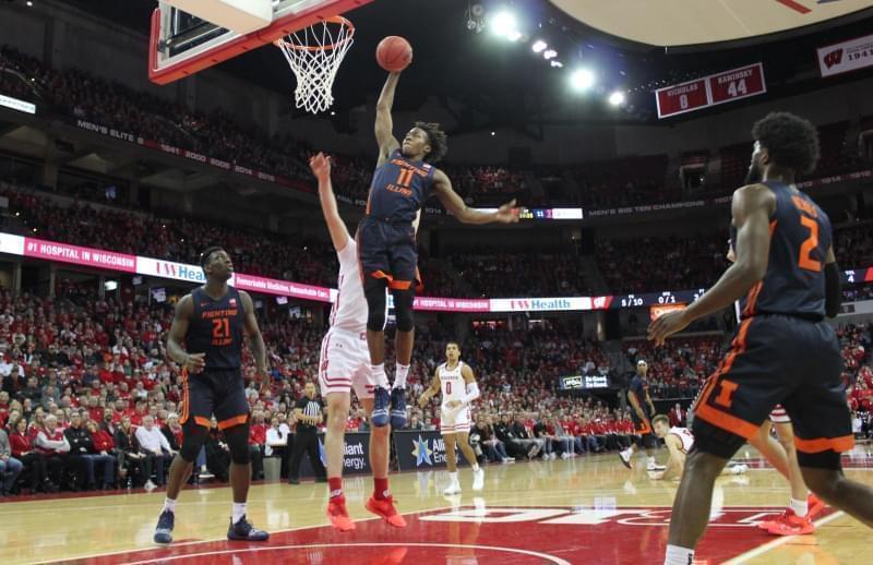 Illinois' Ayo Dosunmu slams in two of his 18 points in the Illini's 71-70 win over Wisconsin Wednesday in Madison.