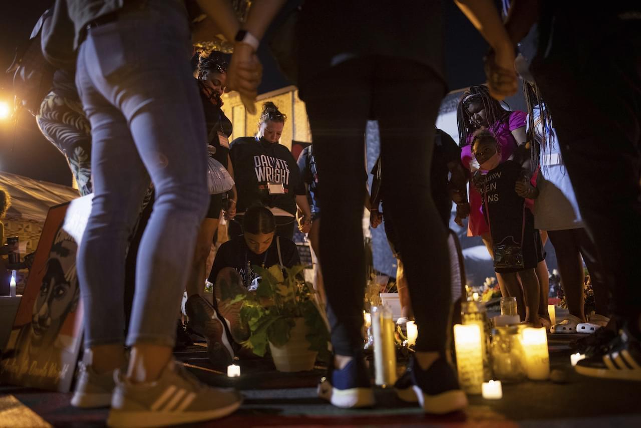 The family of Daunte Wright gathers on the one-year anniversary of George Floyd's death, Tuesday, May 25, 2021, in Minneapolis. Wright was fatally shot by a Minneapolis police officer earlier this year.
