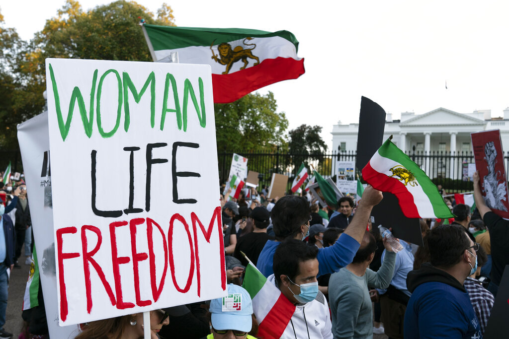 Demonstrators rally outside the White House to protest against the Iranian regime, in Washington, Saturday, Oct. 22, 2022, following the death of Mahsa Amini in the custody of the Islamic republic's notorious 