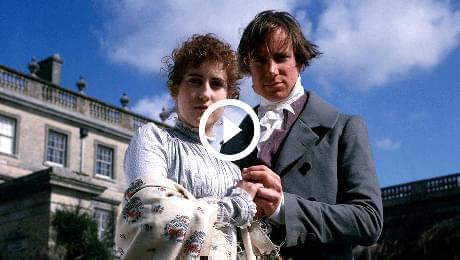 Man and woman embrace, screen shot from the show, click to play