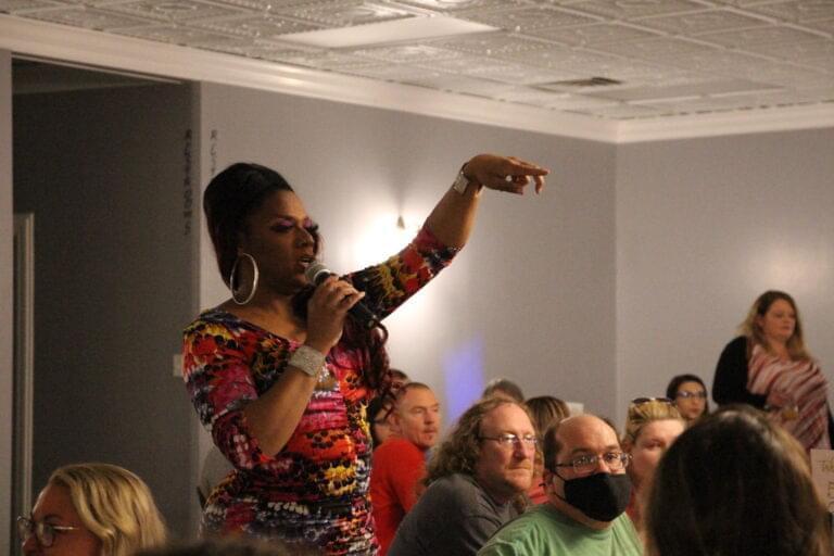 Drag queen Ceduxion Carrington cracks jokes while emceeing at a drag show in Clinton. She’s been performing for about 26 years.
