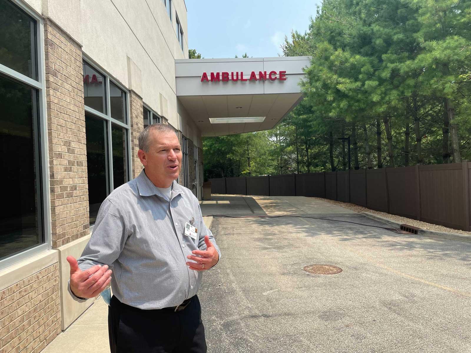 Margaret Mary Community Hospital CEO Tim Putnam stands outside the hospital's recently updated ambulance bay.