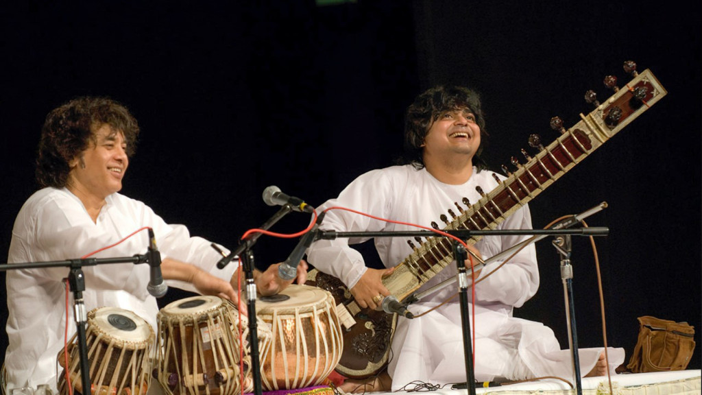 Percussionist Zakir Hussain (left) and sitar player Niladri Kumar are in concert Wednesday evening at Krannert Center for the Performing Arts in Urbana. 