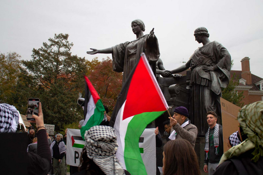 People protested in support of Palestine at the Alma Mater statue at the University of Illinois in Urbana on Nov. 1. The young woman in this story was among the speakers at the event.