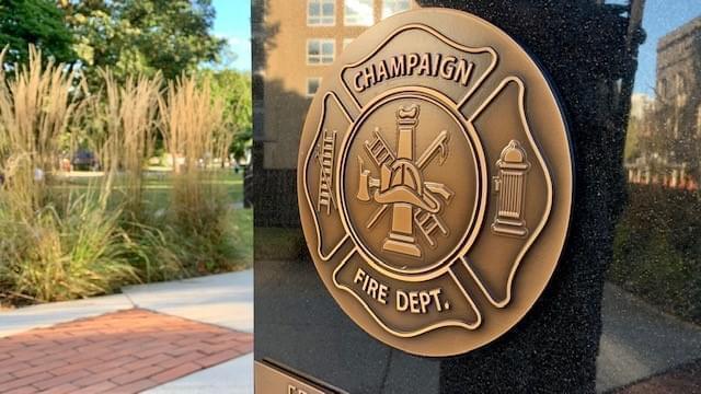 Champaign Fire Department Shield displayed at the firefighter/police memorial in West Side Park.
