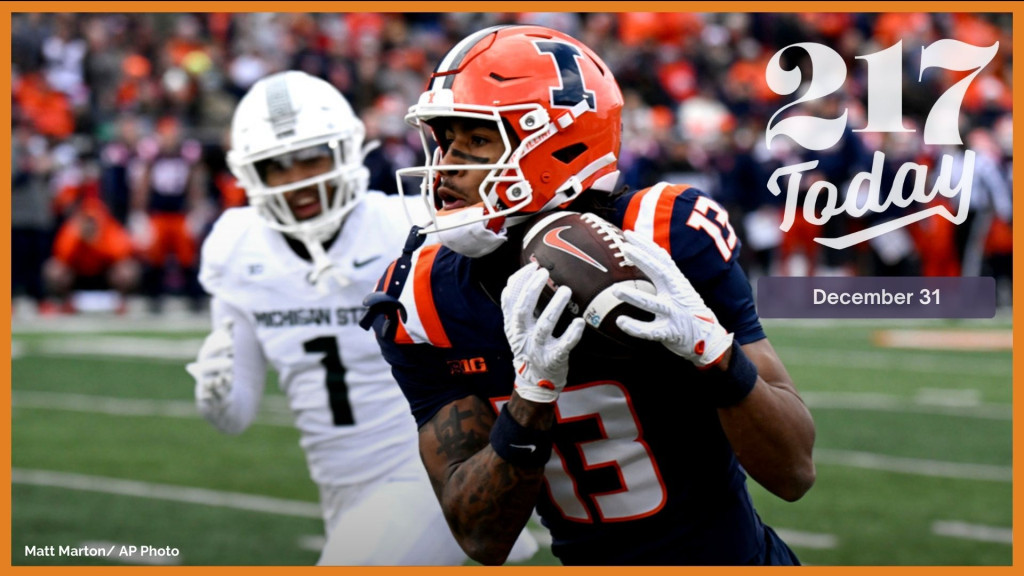 Illinois wide receiver Pat Bryant catches a pass for a touchdown during the first half in an NCAA college football game against Michigan State, Saturday, Nov. 16, 2024, in Champaign, Ill.