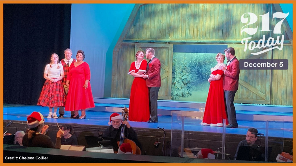 The cast and orchestra at the final dress rehearsal for White Christmas.