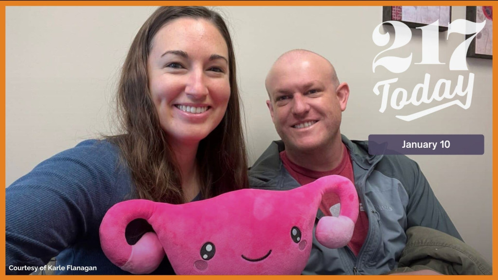 Karle Flanagan and her husband sit in the waiting room at Indiana Fertility Institute in Indianapolis. IVF is the couple's only option to have a child and Flanagan is concerned about how potential government policies could affect access to treatments.