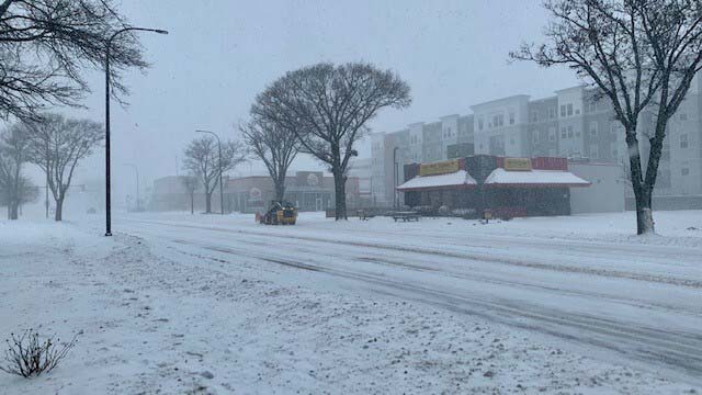 Heavy snow falls along University Ave. in Urbana on Wed. February 2, 2022.