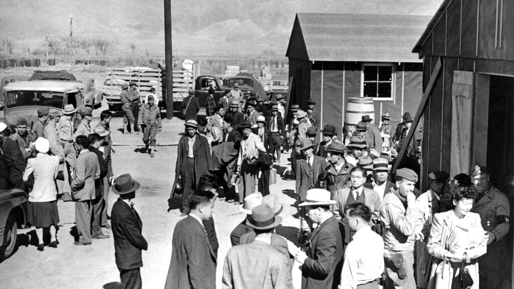 This March 23, 1942, photo shows the first arrivals at the Japanese evacuee community established in Owens Valley in Manzanar, Calif. 