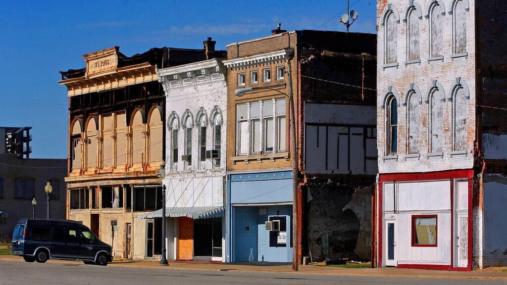 This Oct. 13, 2015 file photo shows abandoned buildings which dominate downtown in Cairo, Ill. Alexander County, Illinois' southernmost county