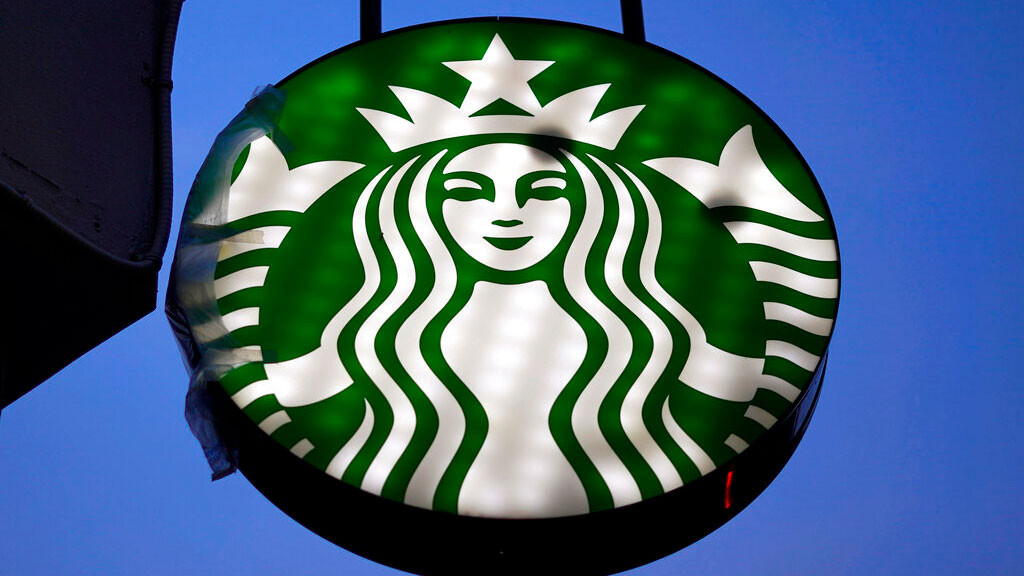 This is the Starbucks logo on a sign outside a downtown Pittsburgh Starbucks, Wednesday, Jan. 12, 2022.