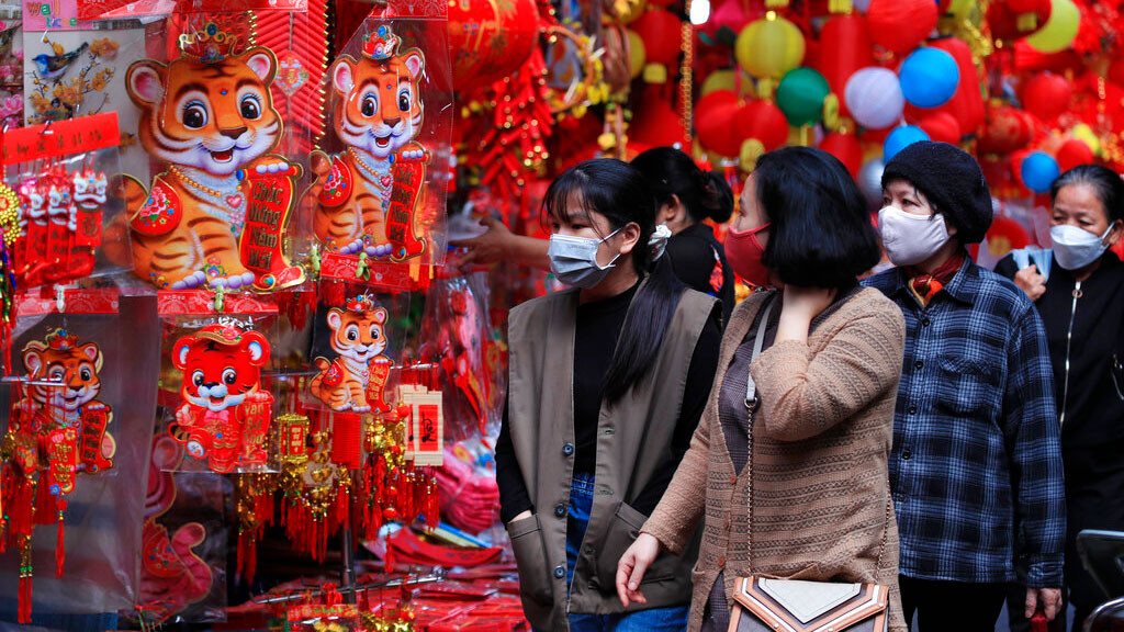 People shop at the traditional Lunar New Year 