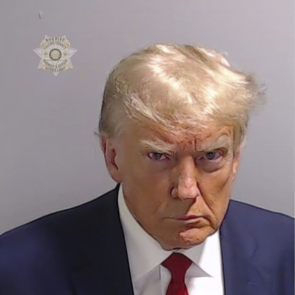 This booking photo provided by Fulton County Sheriff's Office, shows former President Donald Trump on Thursday, Aug. 24, 2023, after he surrendered and was booked at the Fulton County Jail in Atlanta. Trump is accused by District Attorney Fani Willis of scheming to subvert the will of Georgia voters in a desperate bid to keep Joe Biden out of the White House. 
