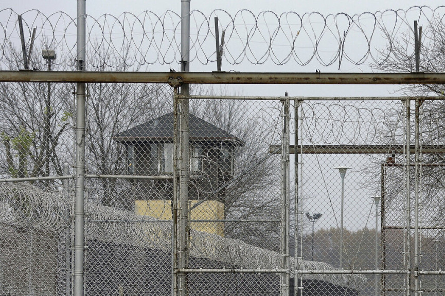 Security fences surround the Illinois Department of Corrections' Logan Correctional Center in Lincoln, Ill.